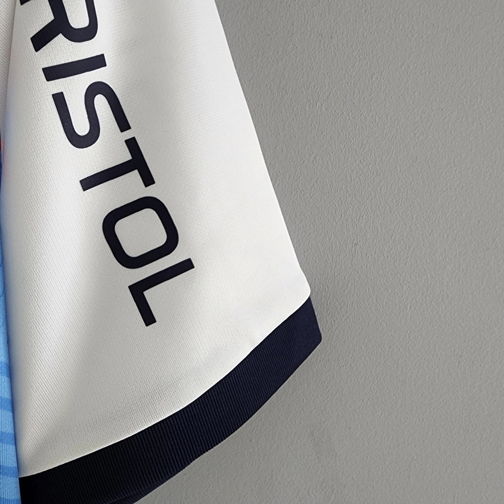 Camisa Cerro Portenho II (Away) 23/24 - Torcedor Masculina - Branco, Azul e Rosa - Manto Elegante