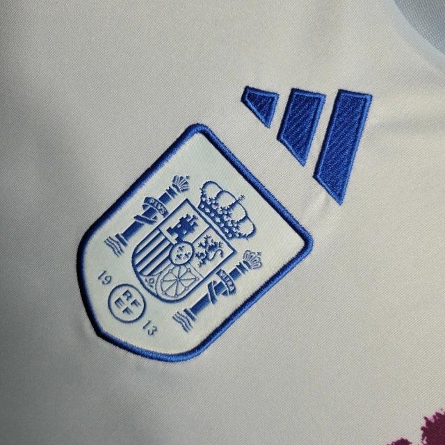 Camisa Seleção da Espanha II (Away) 23/24 - Torcedor Feminina - Branco, Azul e Rosa - Manto Elegante