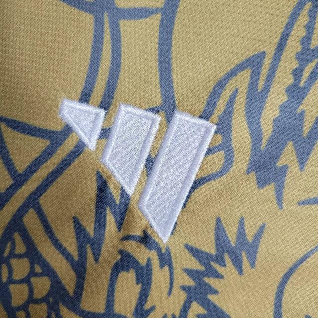 Camisa Real Madrid Edição Especial Dragão 23/24 - Torcedor Masculina - Dourado - Manto Elegante