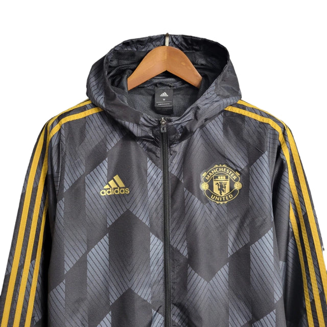 Jaqueta Corta-Vento Manchester United 23/24 - Masculina - Preto - Manto Elegante