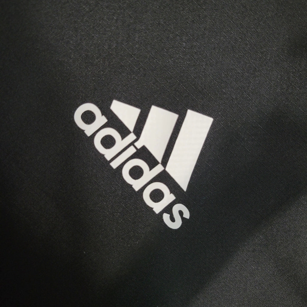 Jaqueta Corta-Vento Real Madrid 23/24 - Masculina - Preto - Manto Elegante