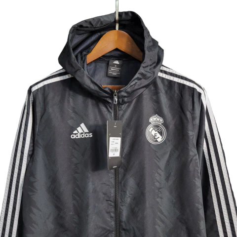 Jaqueta Corta-Vento Real Madrid 23/24 - Masculina - Preto e Branco - Manto Elegante