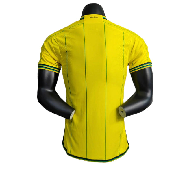 Camisa Jamaica I (Home) 23/24 - Jogador Masculina - Amarelo - Manto Elegante