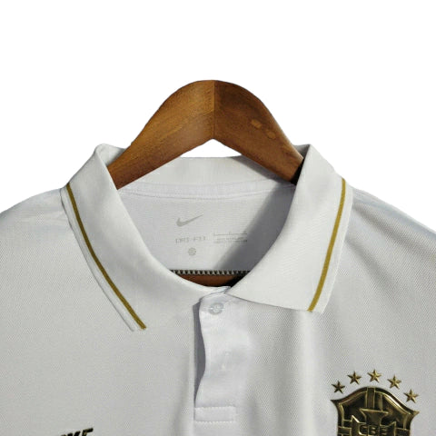 Camisa do Brasil 22/23 - Torcedor Masculina - Polo / Branco-Gold - Manto Elegante